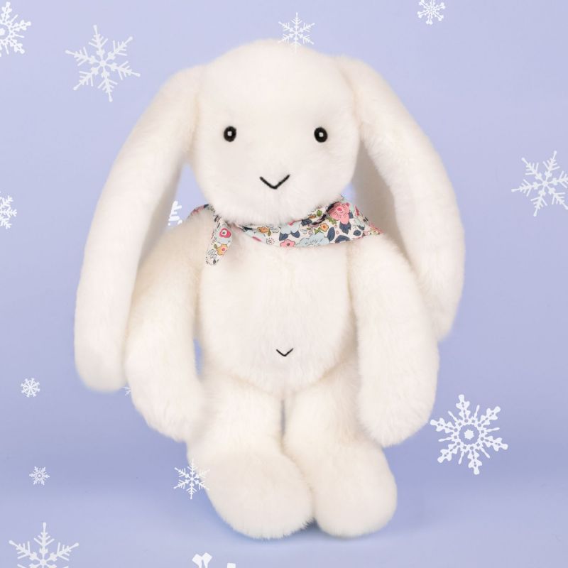 Image d'ambiance de présentation du produit Peluche Lapin Fleurette Blanc (25 cm) - Doudou et Compagnie